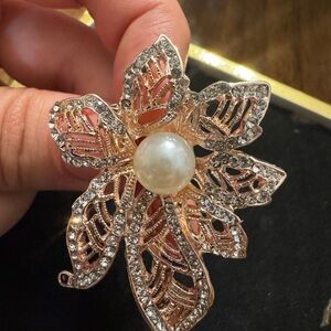 Elegant Gold and Silver Floral Brooch